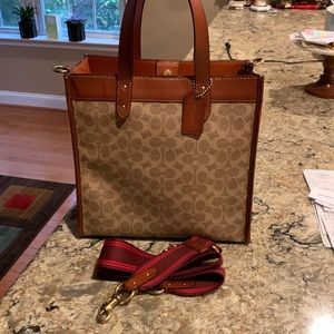 Quality Leather Coach bag. Can be used as crossbody. Bought 4/2021.. has dustbag